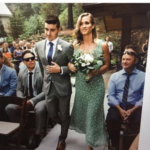 Green floral Reformation dress.